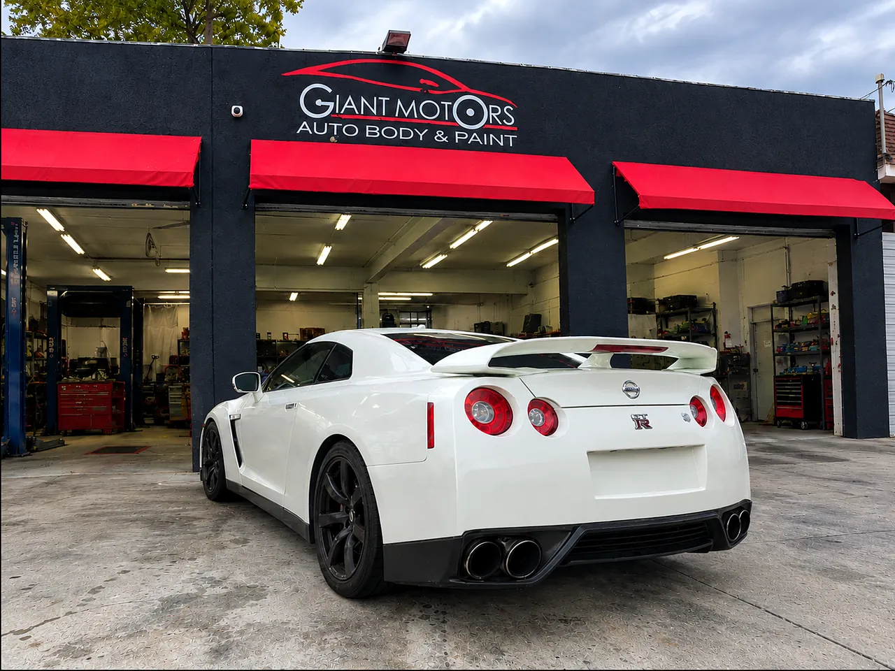 After: the same GT-R with the rear quarter panel repaired